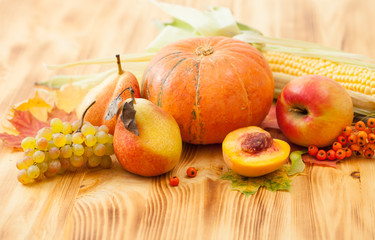Fall foods, harvest on a wooden table. Background.