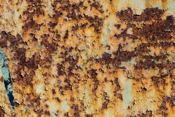 texture of rusty iron, cracked paint on an old metallic surface, sheet of rusty metal with cracked and flaky paint,  abstract rusty metal texture, rusty metal background for design with copy space