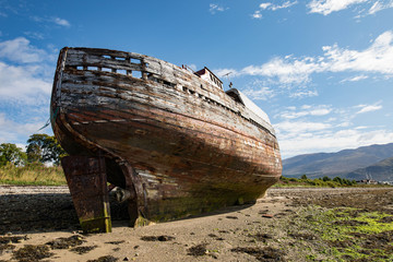 Fototapeta na wymiar Shipwreck on the shores of Loch Linnhe near Fort William, Scotland