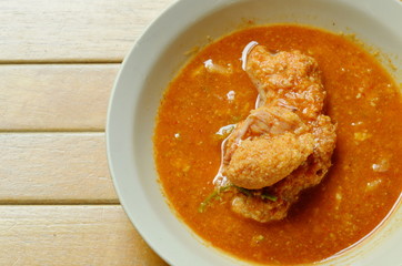 boiled fish egg in spicy and sour soup on bowl