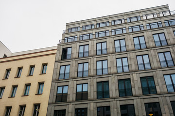 Fototapeta na wymiar grey colored apartment building