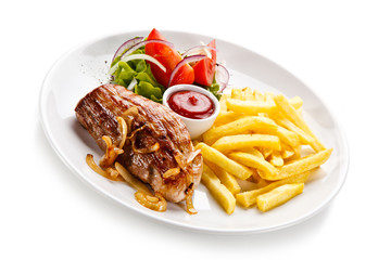 Grilled chicken fillet, chips and vegetable salad 