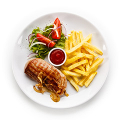 Grilled chicken fillet, chips and vegetable salad 