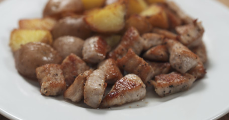 roasted young potatoes with fried pork