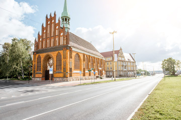 Morning view on the street with saint Peter and Paul Church in Szczecin, Poland