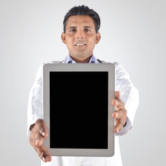 Doctor showing blank tablet pc screen