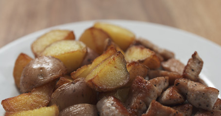 roasted young potatoes with fried pork