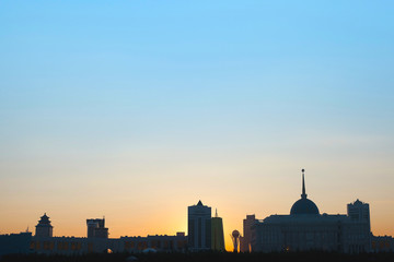 The silhouette of the city of Astana in the evening. Sunset in the capital of Kazakhstan.