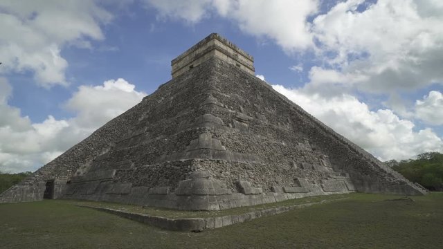 CHICHEN ITZA, MEXICO - MAY 25, 2017: Corner of Maya pyramid temple Kukulkan in peninsula Yucatan at cloudy sunny weather