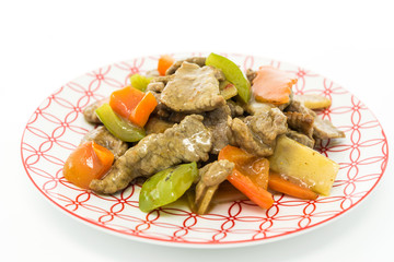 wok fried chicken stir fry with sweet peppers and chinese vegetables