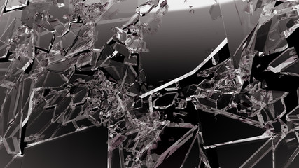 Sharp Pieces of shattered glass isolated on black