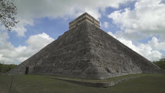 CHICHEN ITZA, MEXICO - MAY 25, 2017: Corner of Maya pyramid temple Kukulkan in peninsula Yucatan at cloudy sunny weather