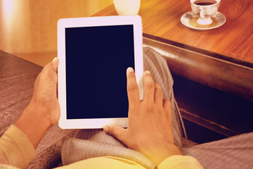 Man looking at blank tablet pc screen