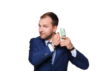 Smiling young businessman holding money isolated on white background, closeup