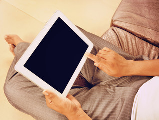 Man holding tablet pc in the office