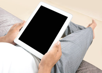 Man holding tablet pc in the office