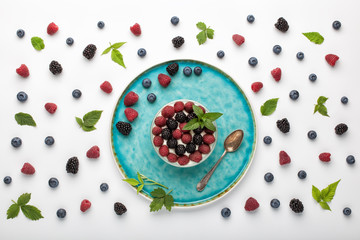 Healthy breakfast with yogurt and berries. Top view, flat lay
