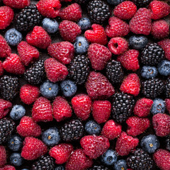 Fruit background made of fresh berries. Flat lay, top view.
