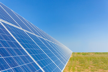 Solar panels on background blue sky. Energy of the future - energy storage.