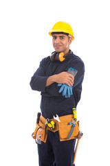 Happy beard worker smiling, guy wearing dark blue workwear and belt equipment with yellow helmet, isolated on white background