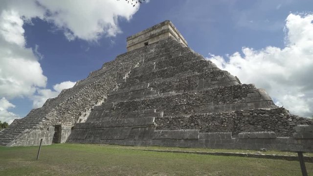 CHICHEN ITZA, MEXICO - MAY 25, 2017: Movement to stairs of Maya pyramid temple Kukulkan in peninsula Yucatan at sunny summer weather