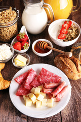 Breakfast served with coffee, orange juice, croissants, cereals