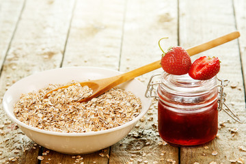 Oatmeal flakes with strawberry jam