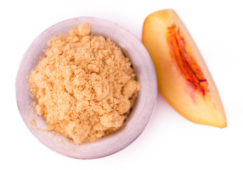 Portion of Ground Peaches isolated on white