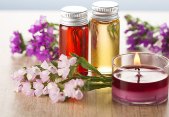 Essential oils, flowers and candle.Spa concept