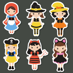 Cute cartoon children in colorful halloween costumes.