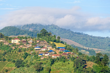 Fototapeta na wymiar Beautiful natural morning landscape small village in the countryside on the mountain at Doi Mae Salong in Chiang Rai Province, Thailand