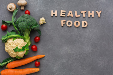 Healthy food. Fresh vegetables on gray background, copy space