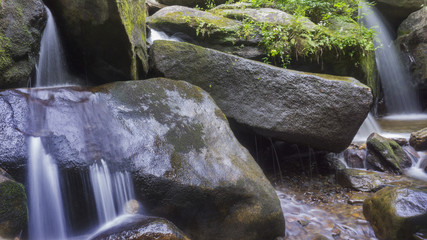 Fototapeta premium Cascading waterfall in the mountains of Western North Carolina.