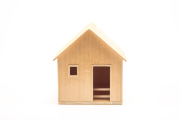 Obraz na płótnie Canvas Toy wooden house model on white