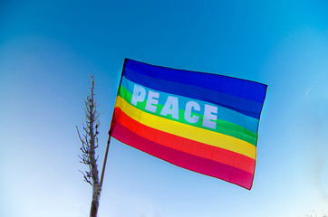 peace flag in the blue sky