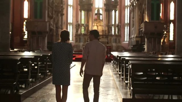Guy and girl in church of San Giovanni Paolo