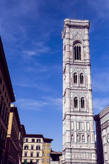 Fototapeta na wymiar The tower of the Cattedrale di Santa Maria del Fiore (Cathedral of Saint Mary of the Flower) in Florence