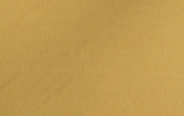 Fototapeta na wymiar Yellow cloth textile material texture background pattern