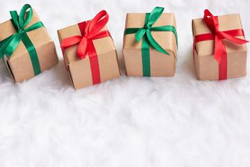 gifts with bright ribbons on snow