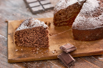 Tasty chocolate cake on table, close-up