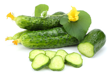 cucumber with sliced cucumber and leaf isolated on white background