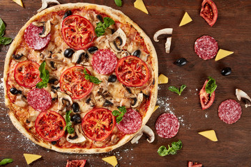 delicious italian pizza served on wooden table