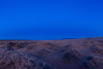 landscape of beautiful sandy desert in evening 