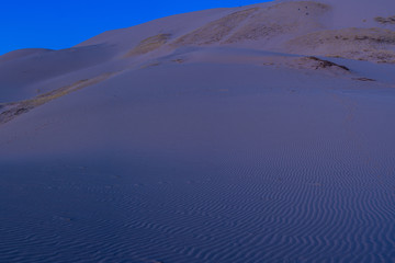 landscape of beautiful sandy desert in evening 
