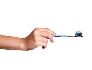 Female hand holding a Toothbrush with toothpaste isolated on white background