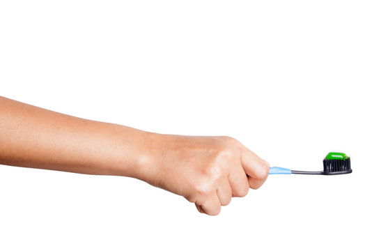 Female Hand Holding A Toothbrush With Toothpaste Isolated On White Background