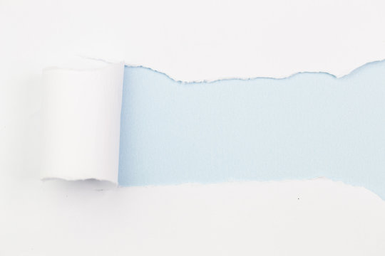 White Paper Torn Outside Blue Paper 