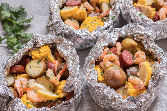 Homemade Traditional Cajun Shrimp Boil with Sausage Potato and Corn foil pack