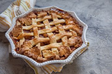 Traditional American Apple pie with fall autumn leaves food decoration