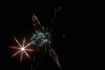Fototapeta premium Festive fireworks in the dark sky